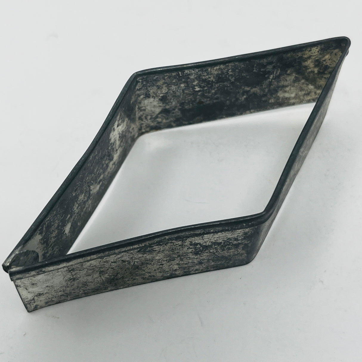 Mid century metal cookie cutters with large handles for easy grip, featuring Christmas and celestial shapes. Includes rare 1930s Pillsbury's Comicooky Cutter.