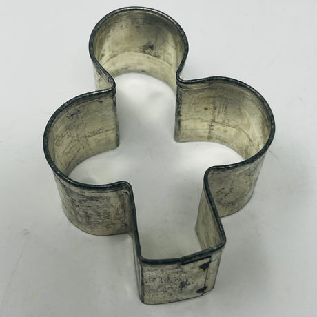 Mid-century metal cookie cutters featuring celestial and Christmas shapes, including rare 1930s designs, with adaptive large handles for easy gripping.