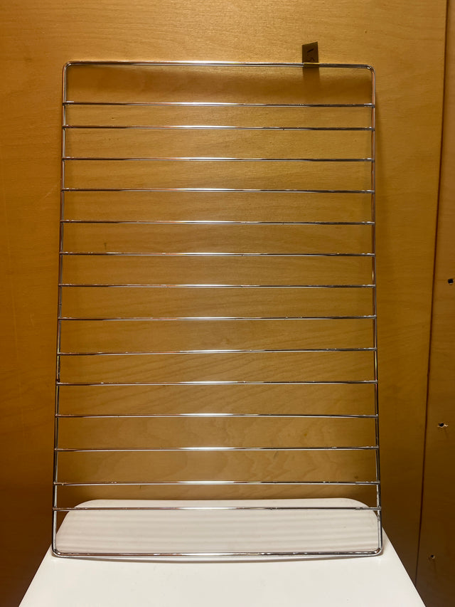 Stainless steel wire oven rack insert showcasing a durable, grid-like structure designed for optimal heat distribution and support during cooking.