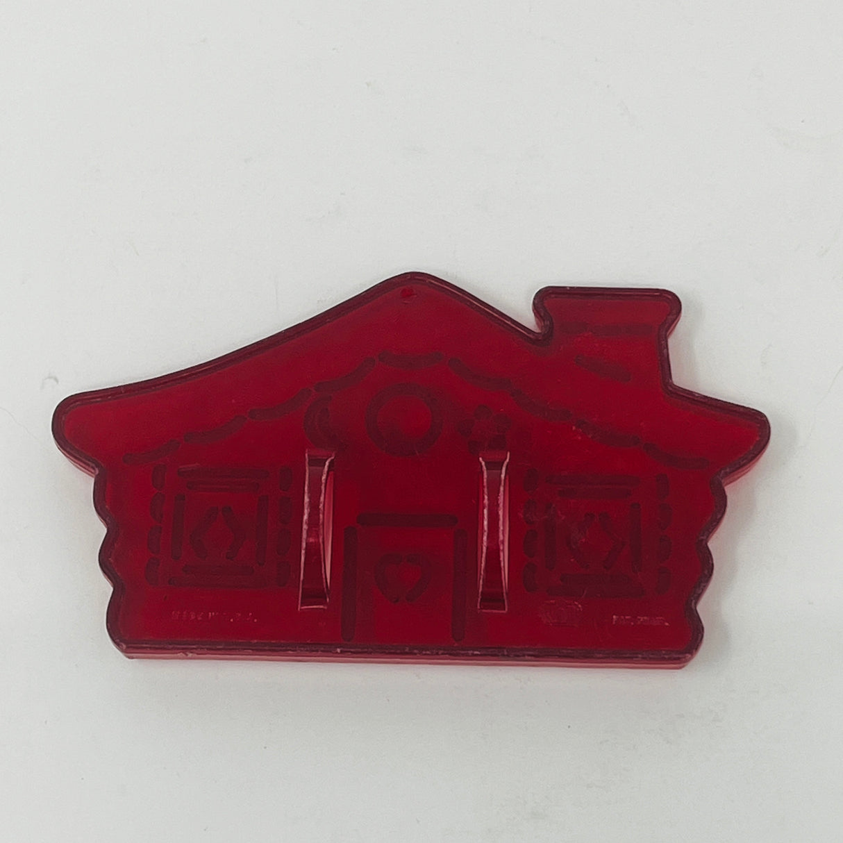 Vintage Red Plastic Cookie Cutters, including house and heart shapes, with Crown logo, made in USA.