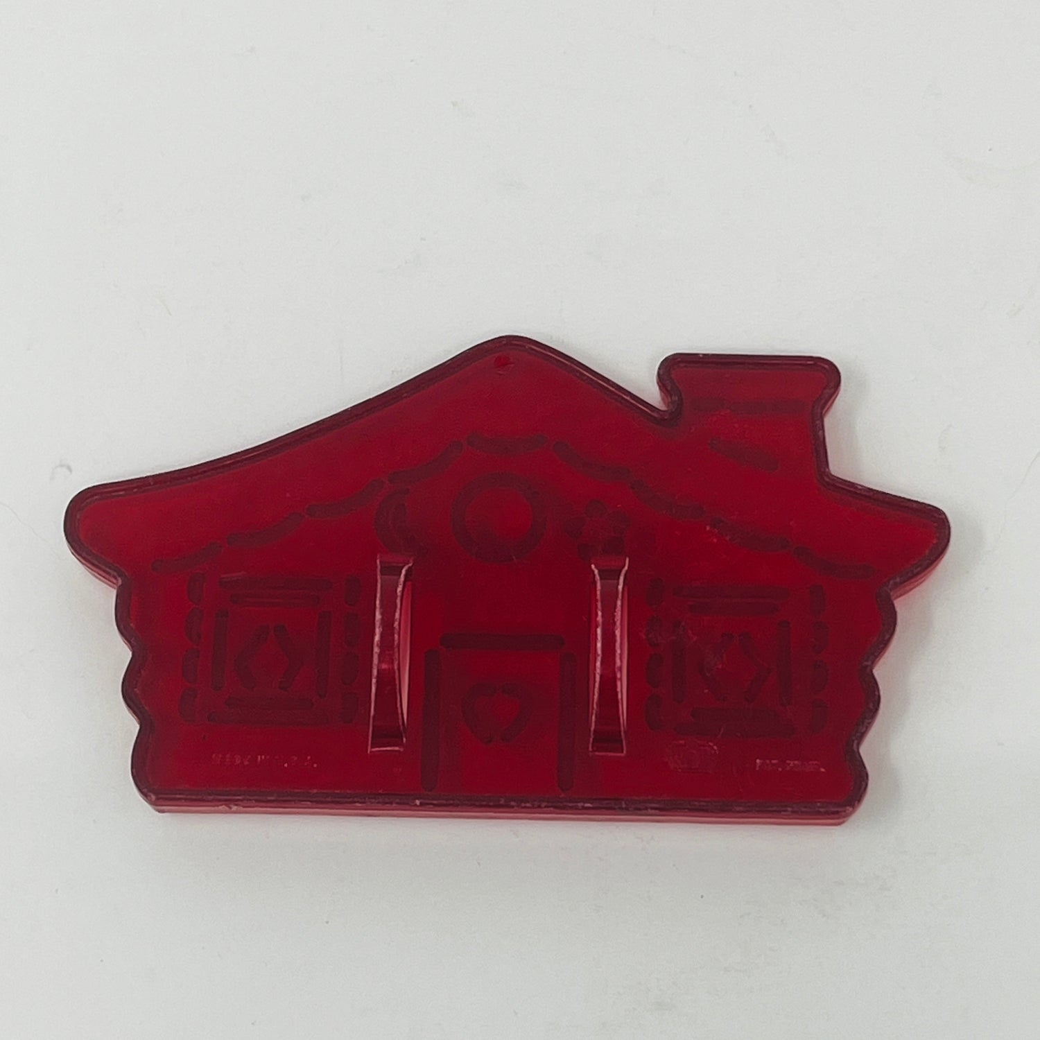 Vintage Red Plastic Cookie Cutters, including house and heart shapes, with Crown logo, made in USA.