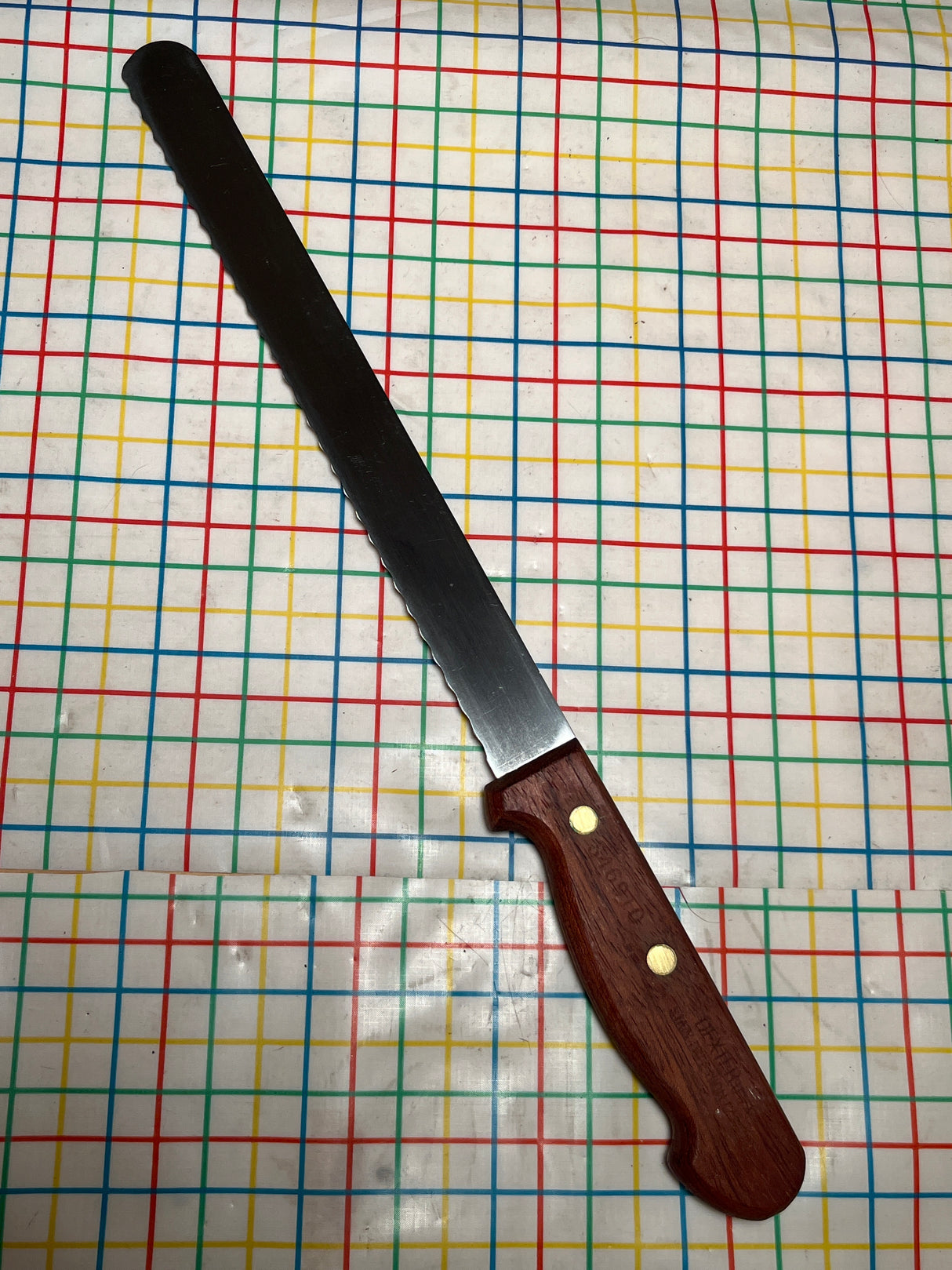 9" serrated bread knife - carbon steel with wood handle - Dexter