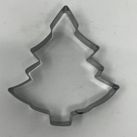 Mid-century metal cookie cutter in a tree shape, part of an adaptive collection featuring easy-grip handles, ideal for creating festive or celestial-themed cookies.