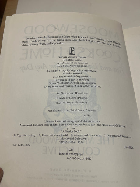 Verso page of Moosewood Restaurant Cooks at Home, listing contributors, copyright (© 1994), Library of Congress data, ISBNs, and imprint details from Simon & Schuster/Fireside.