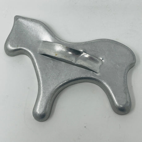 Mid century metal cookie cutter with a large handle, ideal for easy gripping, part of a collection featuring diverse shapes, including vintage Pillsbury's Comicooky Cutter.