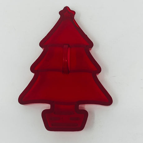 Red plastic mid century cookie cutters, some with Crown logo, in various shapes like Christmas tree and star.