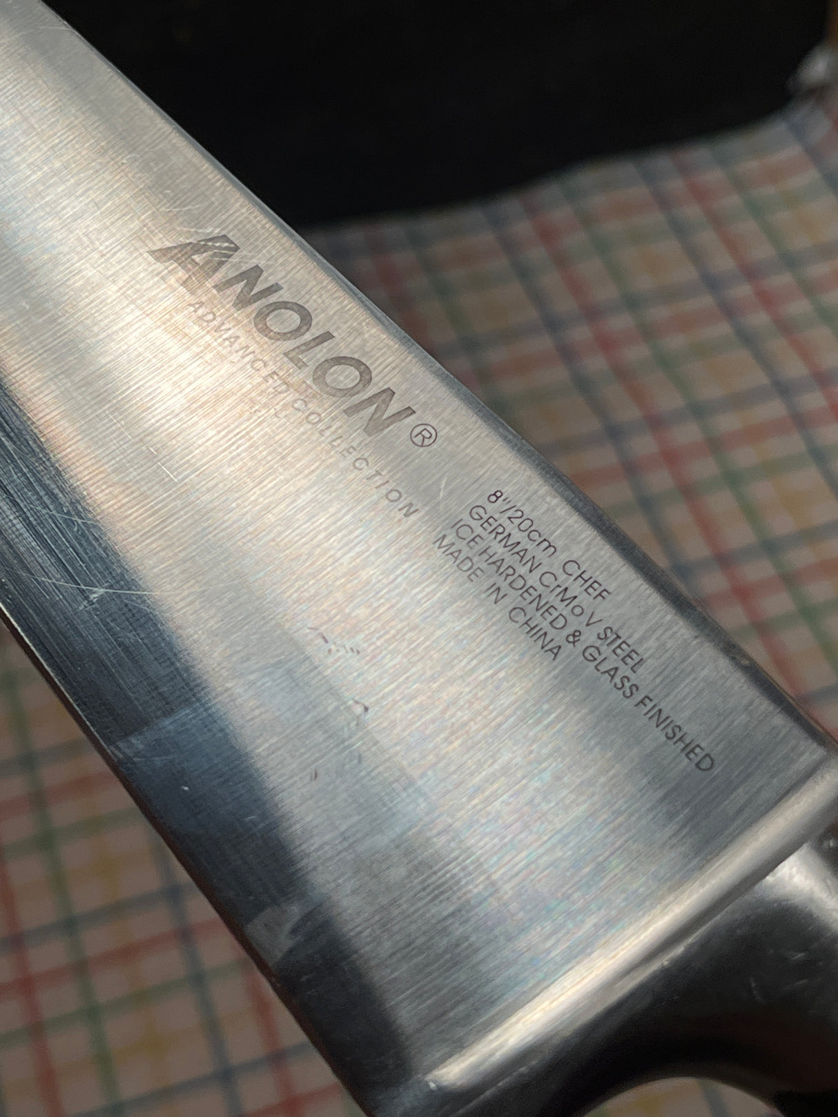 8" Chef knife - carbon steel blade ice hardened and glass finished with Santoprene grip handle - Anolon