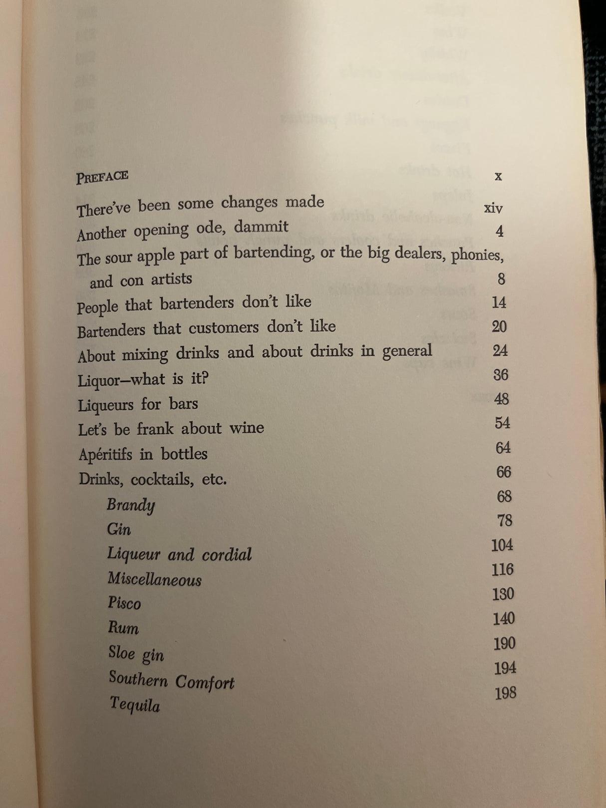 Trader Vic’s Bartender’s Guide (Revised 1972) contents page, detailing chapters on bartending topics, spirits, and cocktail recipes. Book in good condition with corner wear.