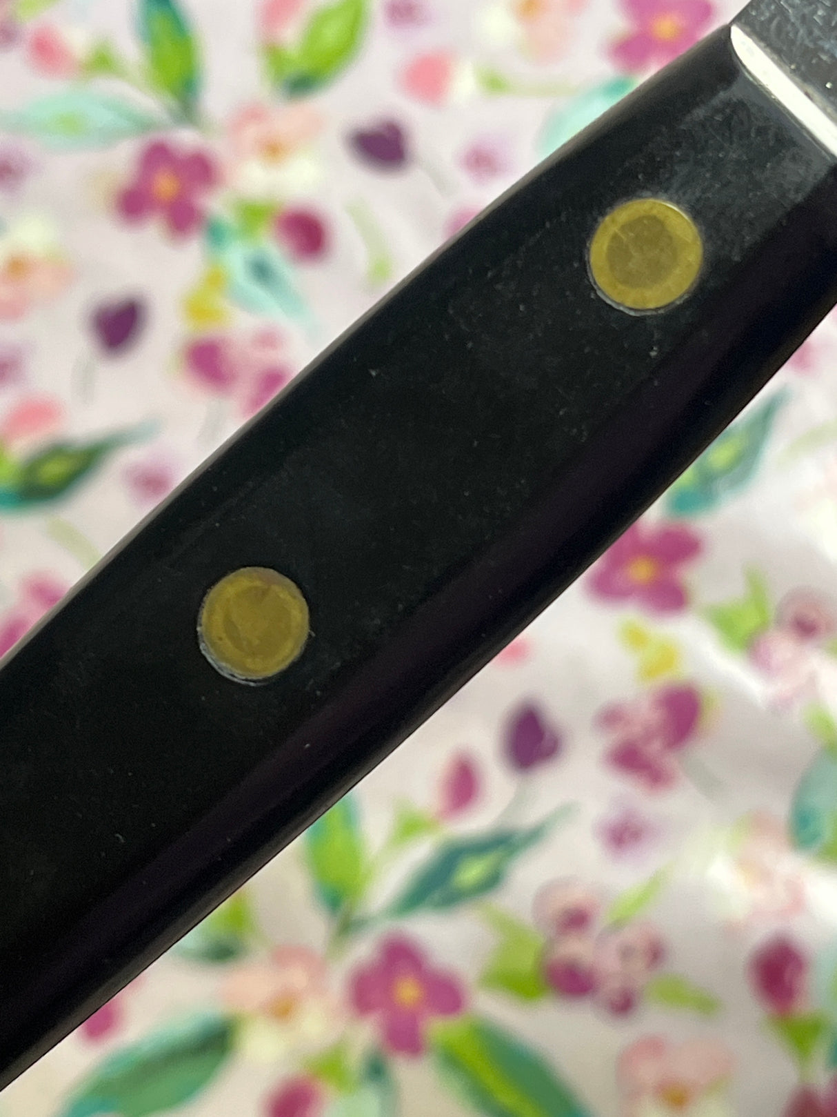 9" serrated bread knife - stainless steel with black bakelite handle - vintage Lucerne