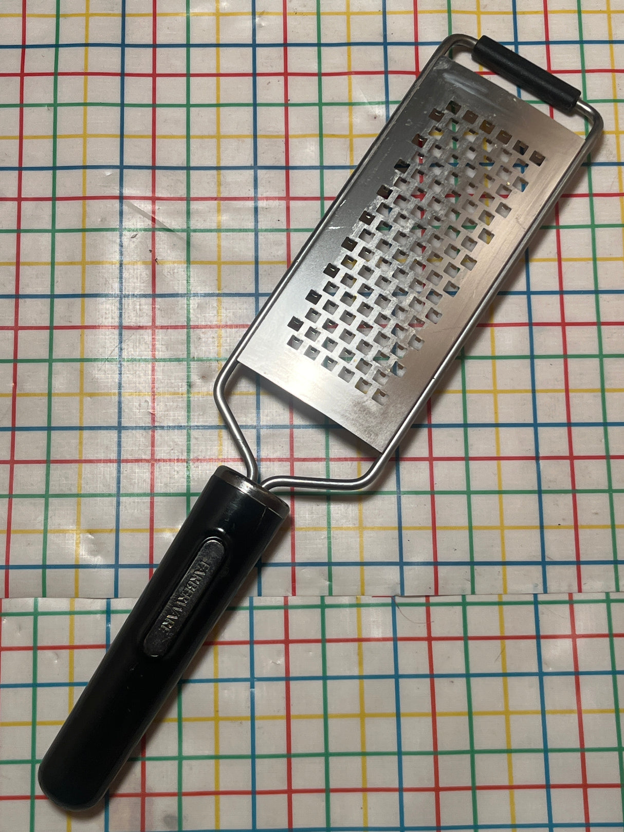 Medium etched grater - stainless steel with plastic handle- Farberware Professional