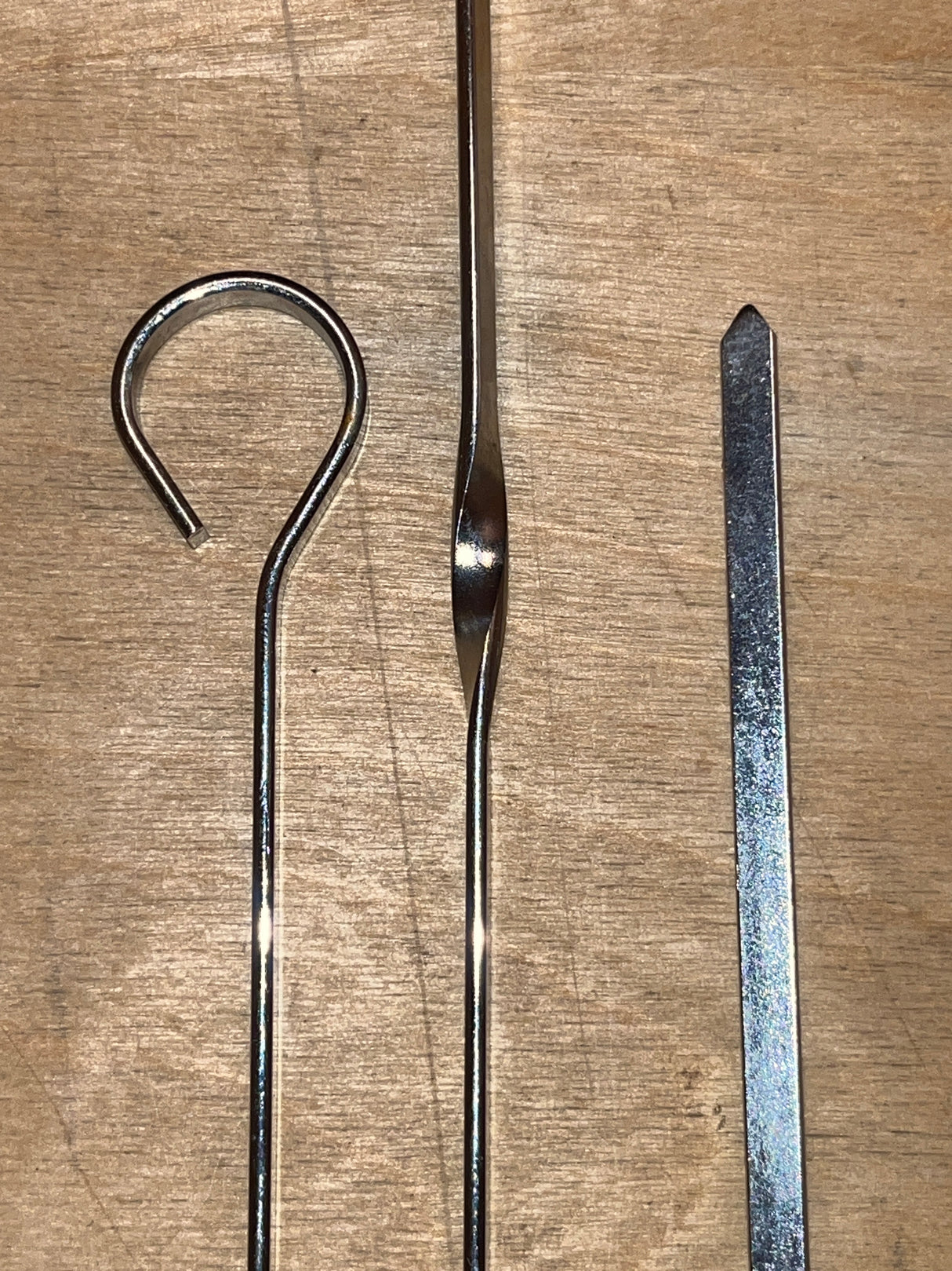 Food skewers - set of 8 reusable 14” stainless steel, featuring round handles, twisted sections, and flat blade styles, ideal for grilling or broiling.