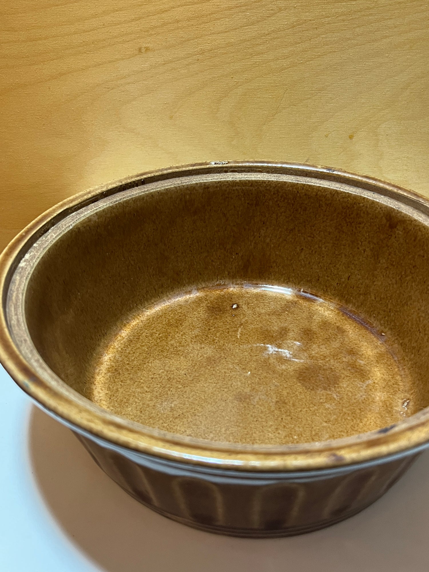 Vintage McCoy 2-quart ceramic Dutch oven from the 1940s, ideal for slow cooking or baking, showcasing a classic design and sturdy build.