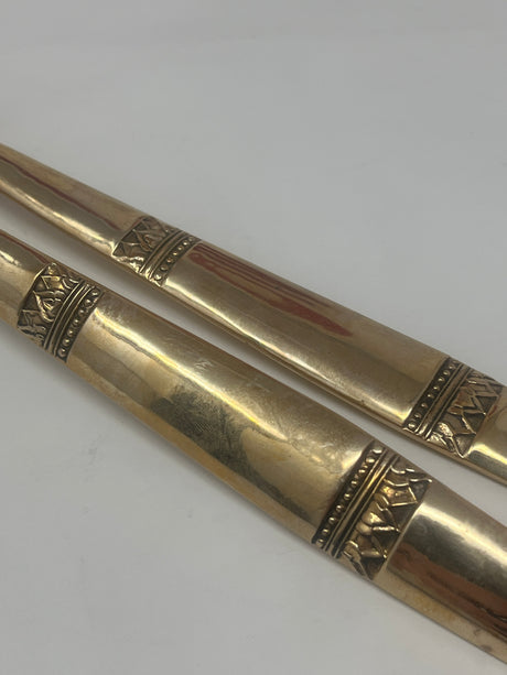 Thai brass serving fork and spoon set with embossed handle design, enhancing dining elegance and functionality in both casual and special occasions.