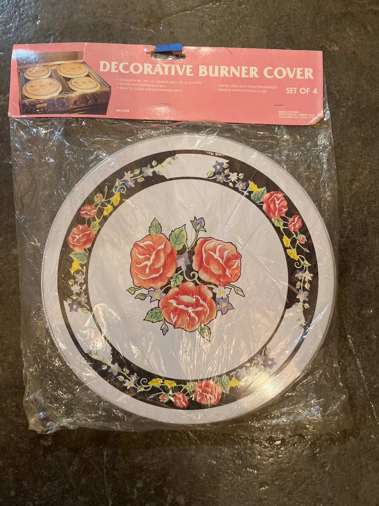 Rosy decorative burner cover set of 4, featuring round metal plates with a floral rose motif; includes one 10 and three 8 covers.