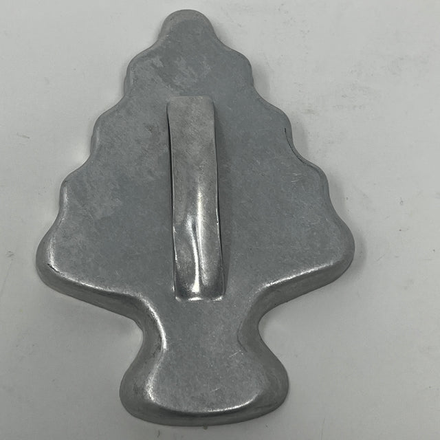 Mid-century metal cookie cutter with a long handle, ideal for easy grip, showcasing a variety of shapes from holiday favorites to rare celestial designs.