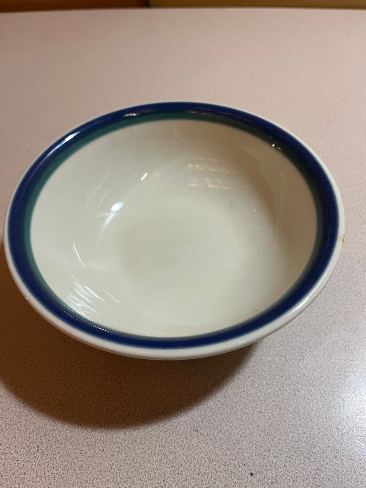 Pfaltzgraff Ocean Breeze dinnerware set featuring elegant plates and bowls with a subtle wave pattern, perfect for enhancing any dining table setting.