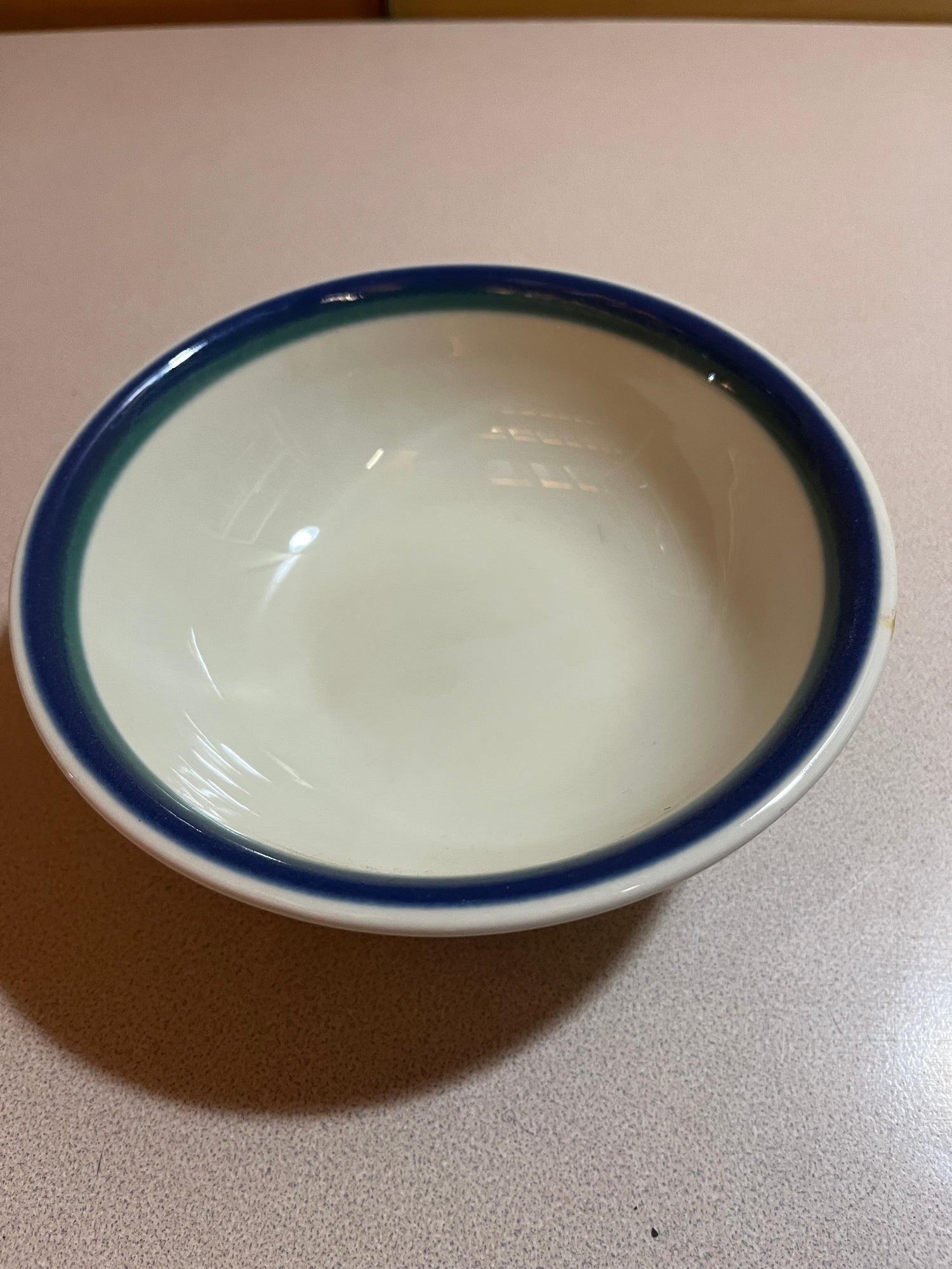 Pfaltzgraff Ocean Breeze dinnerware set featuring elegant plates and bowls with a subtle wave pattern, perfect for enhancing any dining table setting.