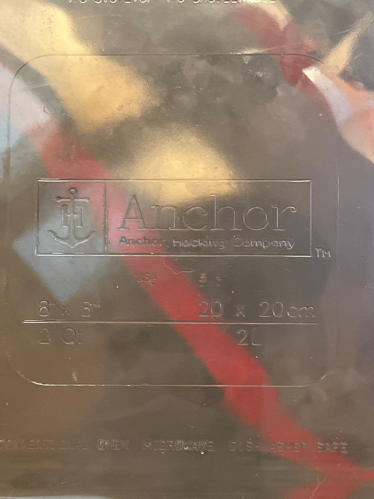 Casserole dish square 2 quart/2 liter - Anchor Hocking Basics, showing logo, dimensions, capacity, and notes on microwave and dishwasher safety.