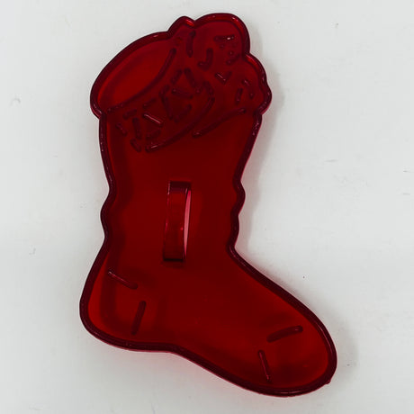 Vintage red plastic cookie cutters, some with Crown logo, mid-century style.