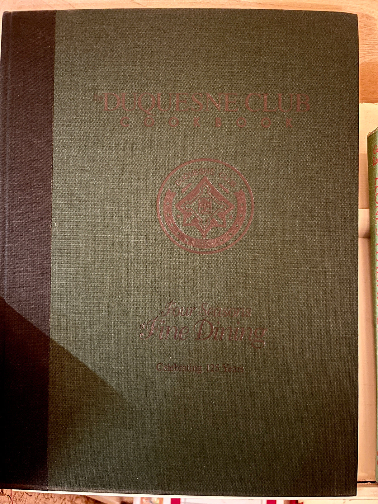 RARE Duquesne Club Cookbook: Hardcover featuring the title and emblem, celebrating 125 years of fine dining with Four Seasons of Fine Dining subtitle.