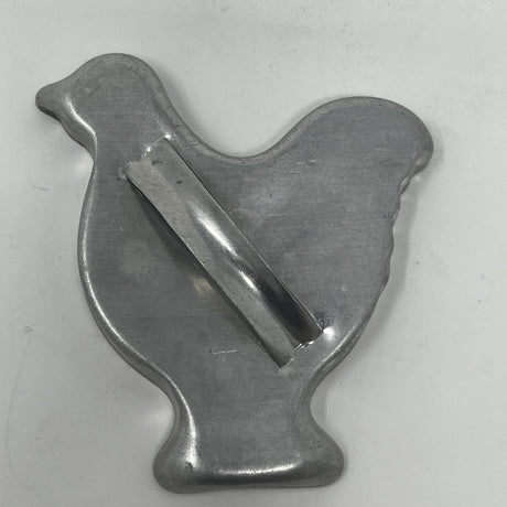 Mid-century metal cookie cutters featuring adaptive grips; includes Christmas and celestial shapes. Some pieces, like the 1930s Pillsbury's Comicooky Cutter, vary in price by rarity.