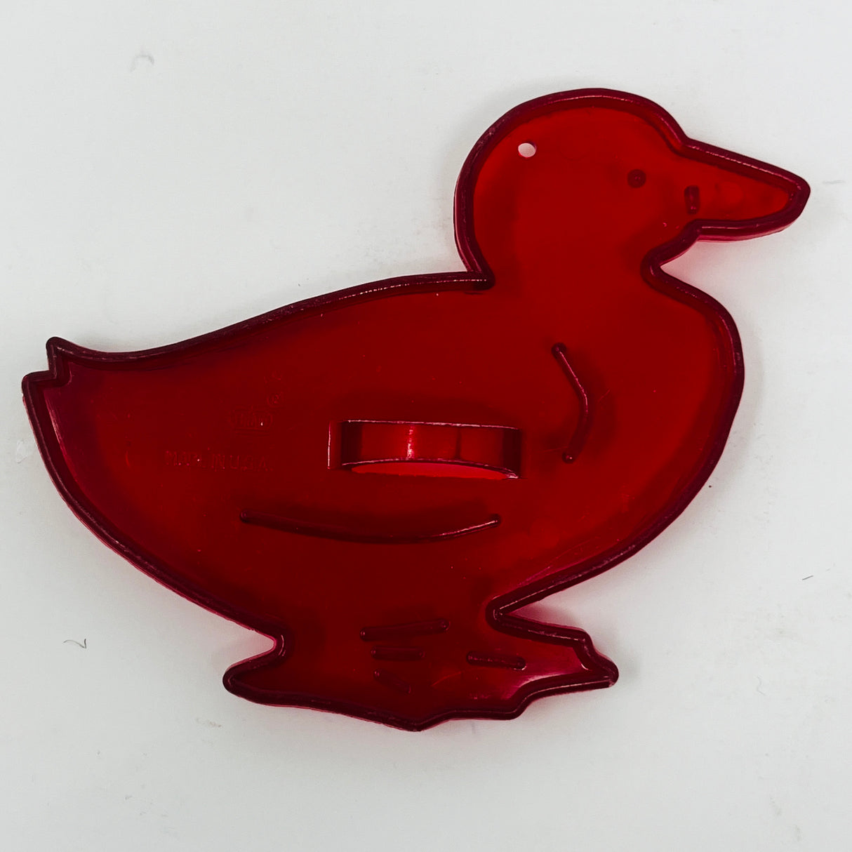 Red plastic duck and bird shaped cookie cutters from mid century, some with HRM Crown logo.