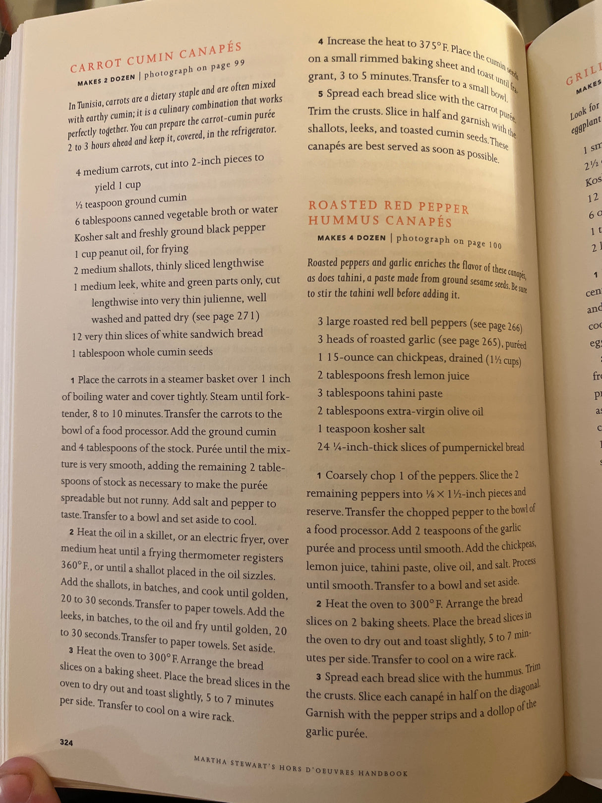 Martha Stewart’s Hors d’Oeuvres Handbook open to recipes for Carrot Cumin Canapés and Roasted Red Pepper Hummus Canapés, detailing ingredients and preparation steps.
