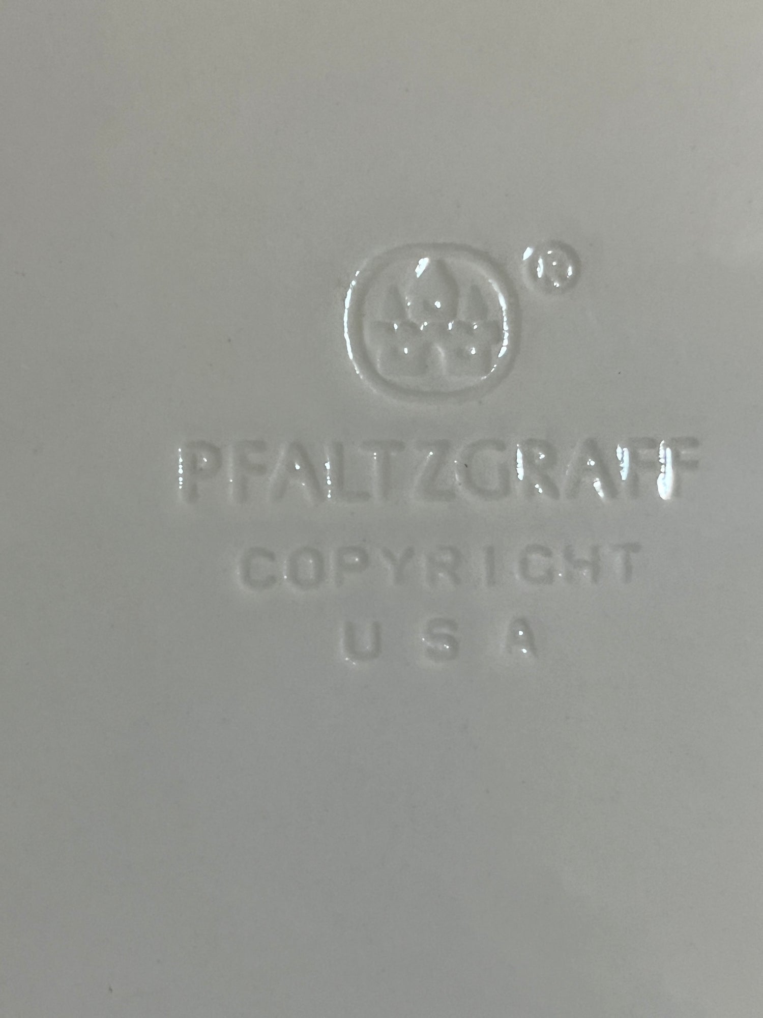 Pfaltzgraff Ocean Breeze dinnerware set displayed with elegant, smooth design, featuring distinct patterns that suggest a serene, coastal dining experience.