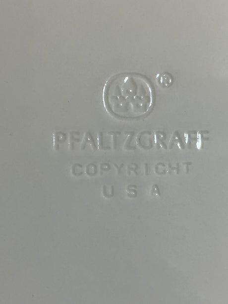 Pfaltzgraff Ocean Breeze dinnerware set displayed with elegant, smooth design, featuring distinct patterns that suggest a serene, coastal dining experience.