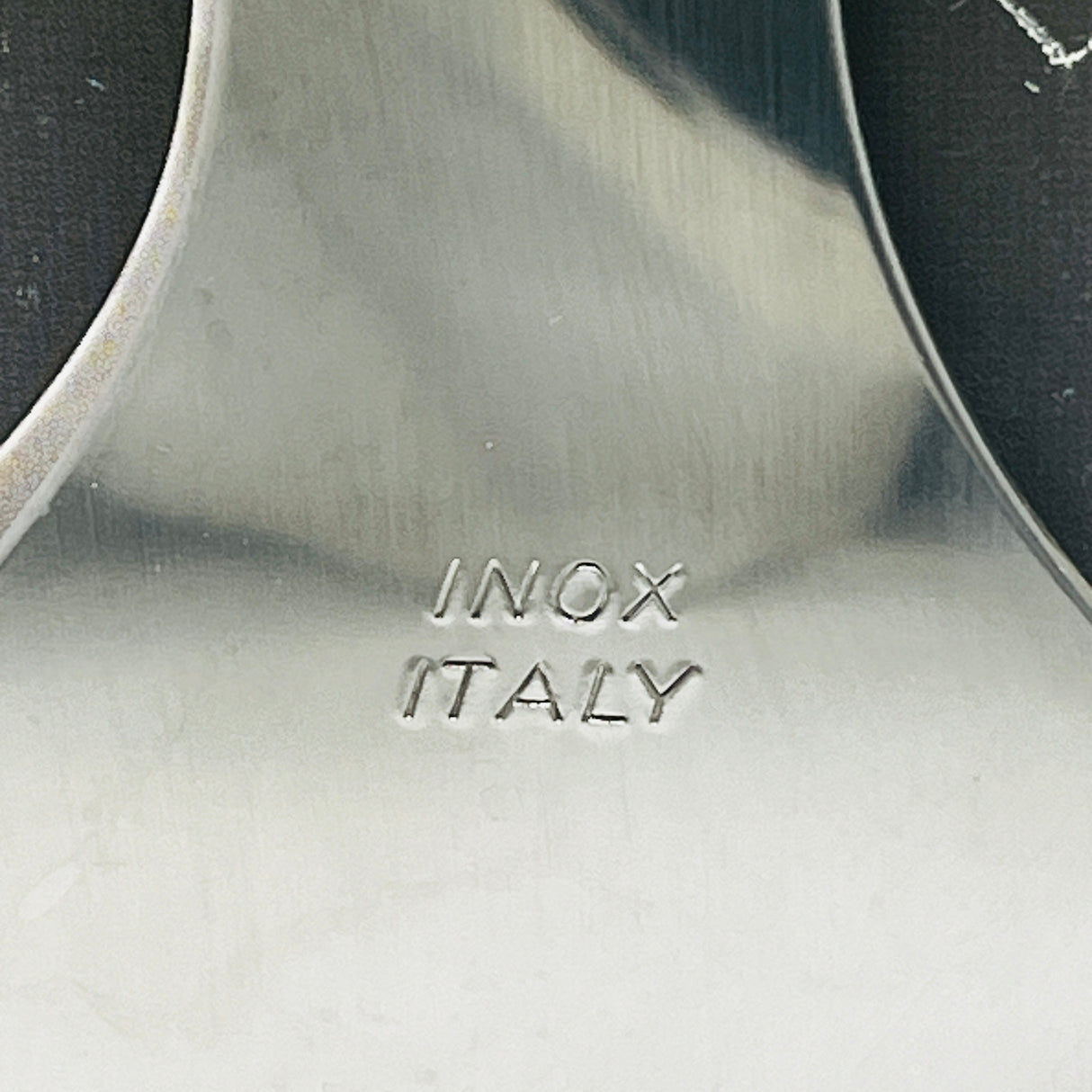 Vintage Italian-made Tagliatartufi Chocolate Shaver, close-up of INOX ITALY etched in the steel handle. From Spoons Kitchen Exchange.