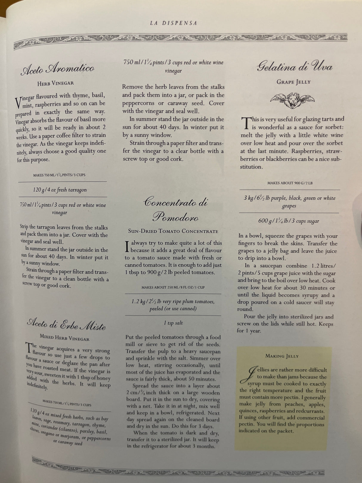 Page from La Dispensa in The Villa Table cookbook featuring recipes for herb vinegar, mixed herb vinegar, sun-dried tomato concentrate, and grape jelly, with detailed instructions.
