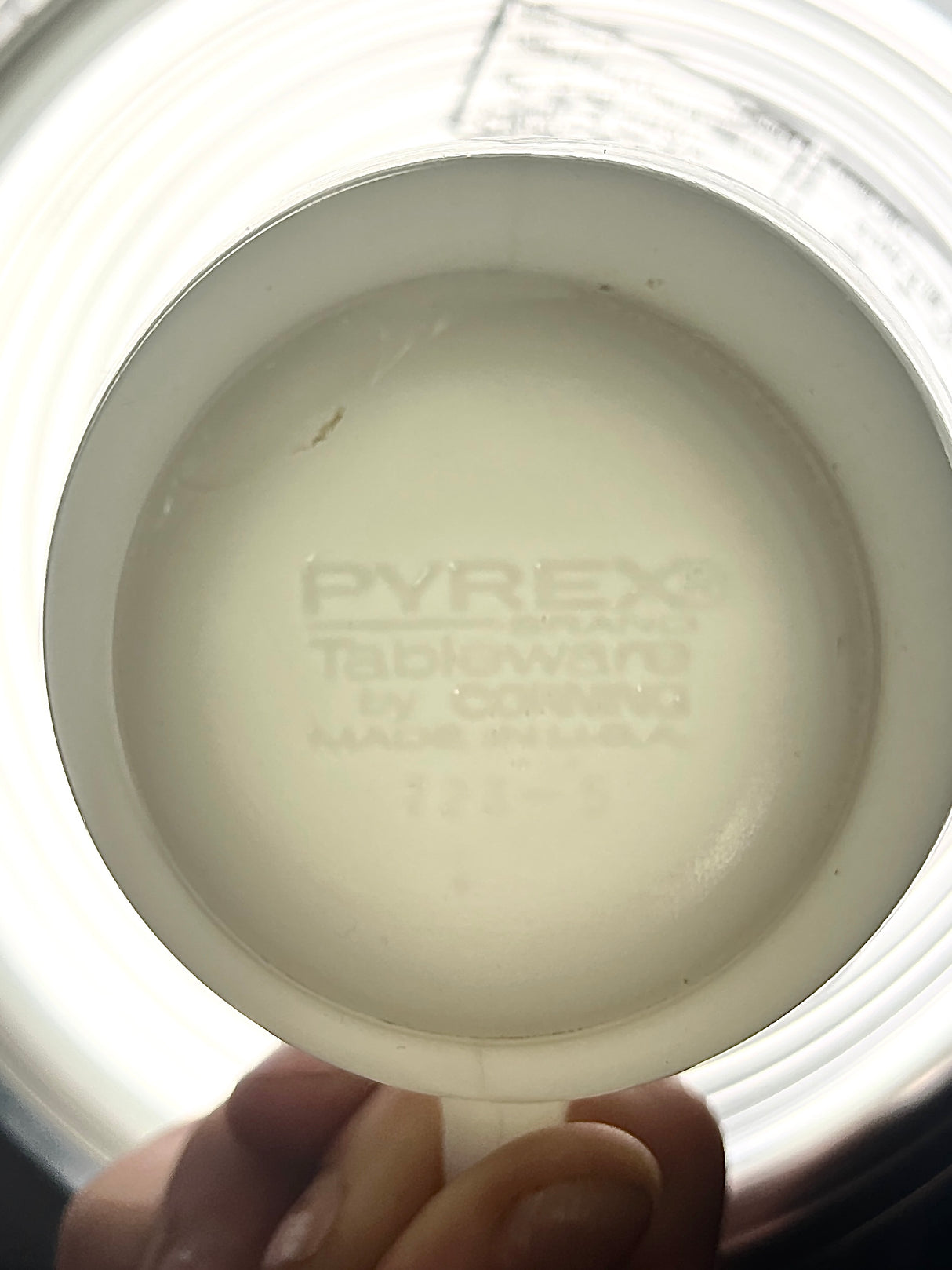 Vintage Pyrex 723-5 Tableware Corning Milk Glass Mugs, close-up of white cup and container, person's finger and letter.