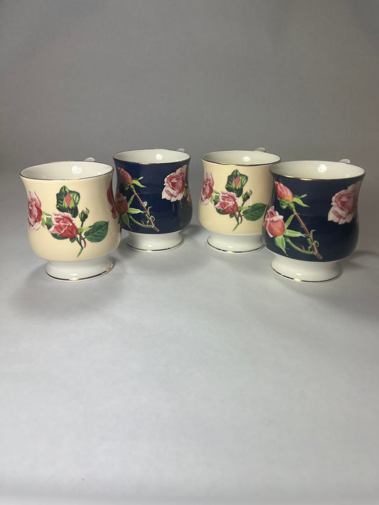 Kew Gardens Rose Teacup set with gold rim - SET OF 4, a group of floral ceramic teacups with painted designs.