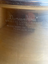 Stock pot with lid and black handles - vintage Duncan Hines 3-ply 18-8 stainless steel, marked by Revere Ware, Kewaskum, Wisconsin, on the bottom.