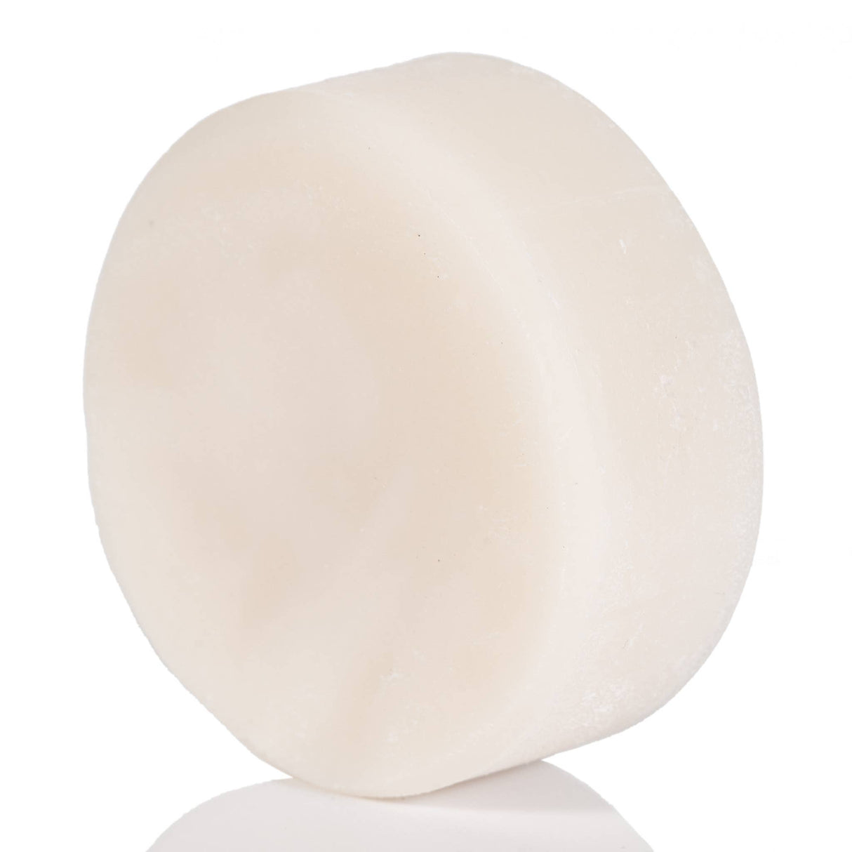 Solid Dish Soap Zero Waste: A white, puck-shaped bar for eco-friendly cleaning, made with saponified coconut and castor oil, perfect for a greener kitchen.
