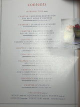 Martha Stewart’s Hors d’Oeuvres cookbook contents page shows chapter titles, page numbers for photographs and recipes, and sections like Menus and Equipment in 'The Guide'.