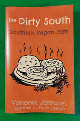 Cover of The Dirty South: Southern Vegan Eats zine, featuring steaming biscuits illustration by Sarah Oleksyk. Authored by Vanessa Johnson, offering 64 pages of vegan southern recipes.