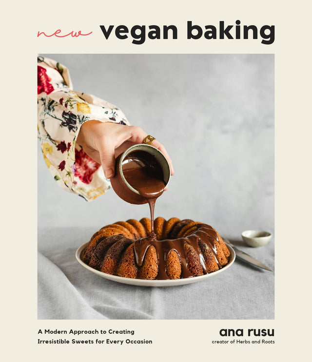 Cover of New Vegan Baking: Irresistible Sweets For All Occasions with a hand pouring chocolate glaze over a bundt cake, authored by Ana Rusu.