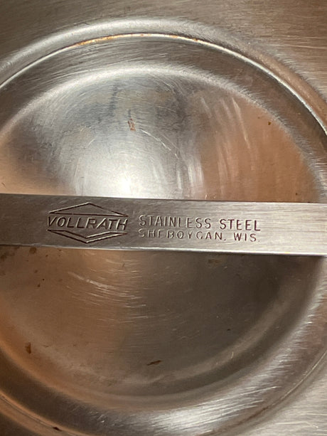 Large stock pot heavy duty (~28L) - vintage Vollrath. Inside view shows embossed logo and “Stainless Steel – Sheboygan, Wis.” on rim, ideal for commercial kitchens.