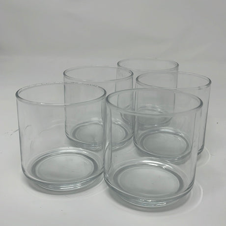 Short tumbler glasses - set of 5, a group of empty and clear glass drinkware on a white surface.