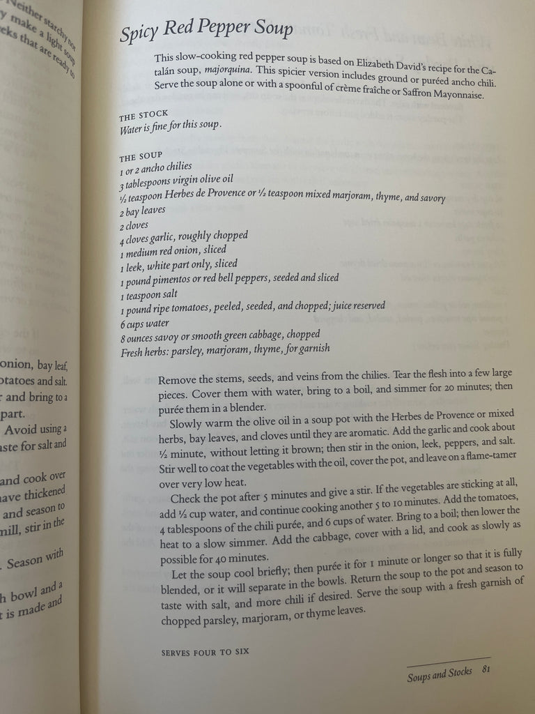 The Greens Cookbook open to a recipe page, showcasing detailed text and layout.