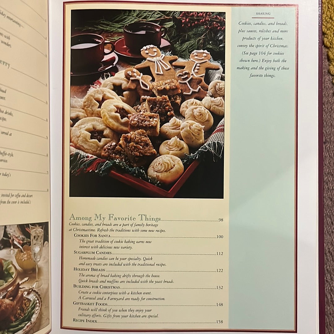 Cover of A Festive Christmas: Holiday Recipes and Tablesetting Ideas featuring cookies, coffee, and food imagery, highlighting festive culinary creations and table decor insights.