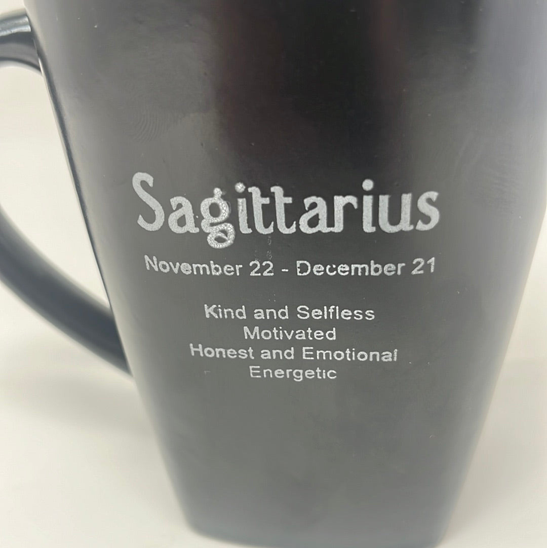 A black coffee mug with Sagittarius inscribed on the front and Sagittarius traits on the back. Ideal for Sagittarius coffee lovers.