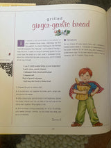 Mary Engelbreit's Dining Out Cookbook showing a recipe page with a cartoon boy holding a grocery bag.