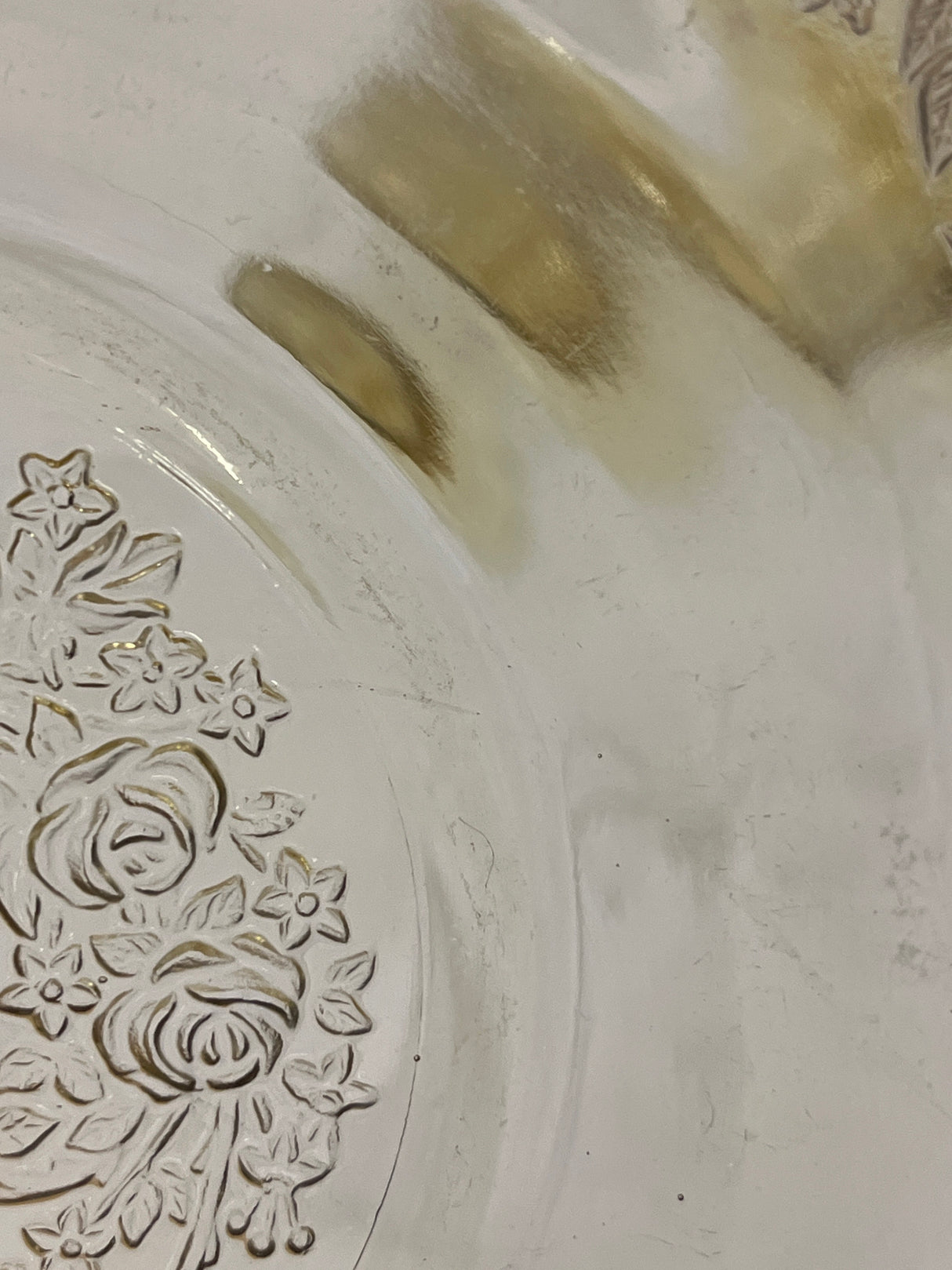 1930s Federal Glass Amber Sharon / Cabbage Rose fruit bowl showcasing intricate embossed floral details and a light yellow tint, highlighting its vintage allure and pristine condition.