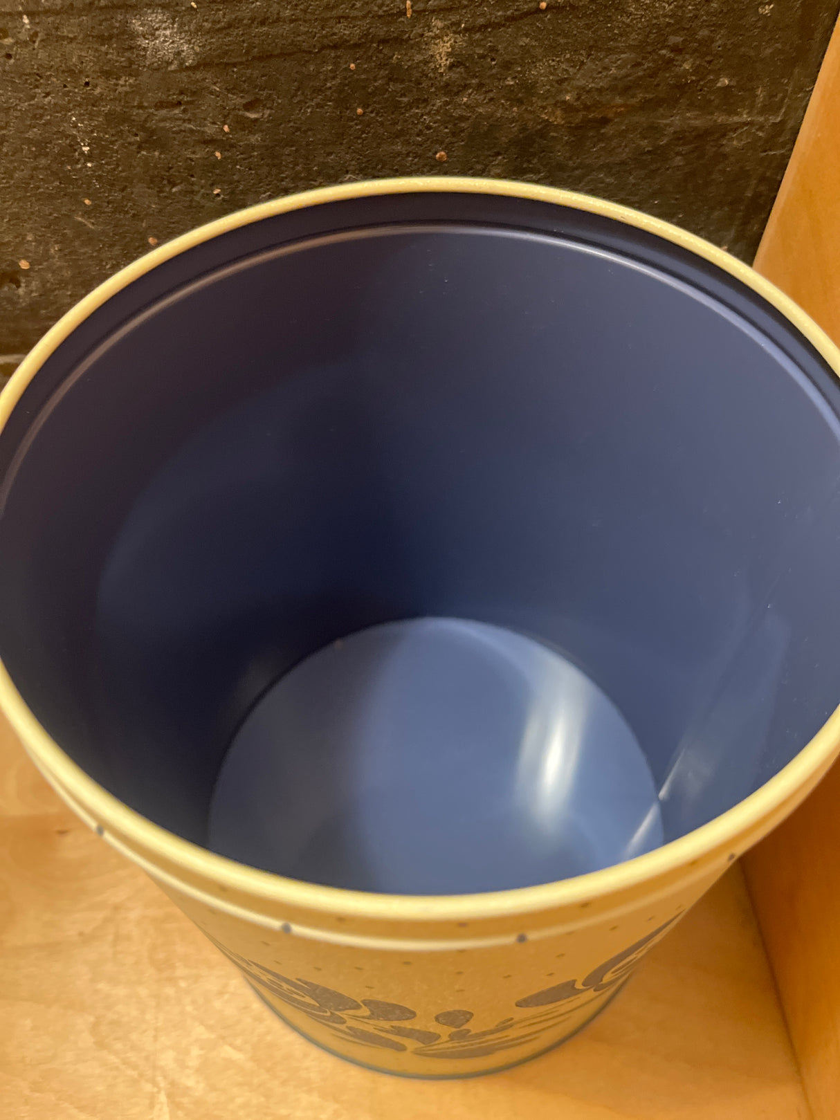 Pfaltzgraff vintage polka dot food storage tin, featuring a floral pattern on a round, open container, perfect for keeping cookies fresh with its airtight seal.