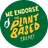 Green circular sticker with yellow text and a white hand icon, endorsing the plant-based treaty.