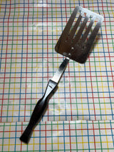 Slotted spatula turner - stainless steel with Bakelite handle - vintage Cutco 1716