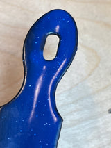 Blue speckled enamelware fry pan with a long handle, ideal for camping. Features a durable, classic granite-ware finish and elongated oval hanging hole.