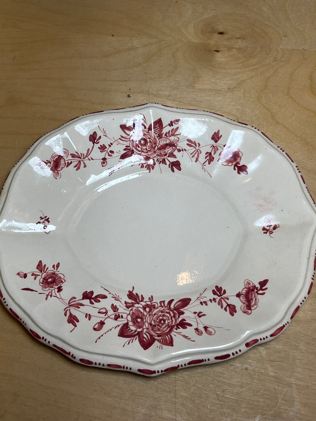 Porcelain soup tureen set with lid, underplate, and ladle, featuring hand-painted red roses, displayed on a wooden surface. Made in Italy, great condition.